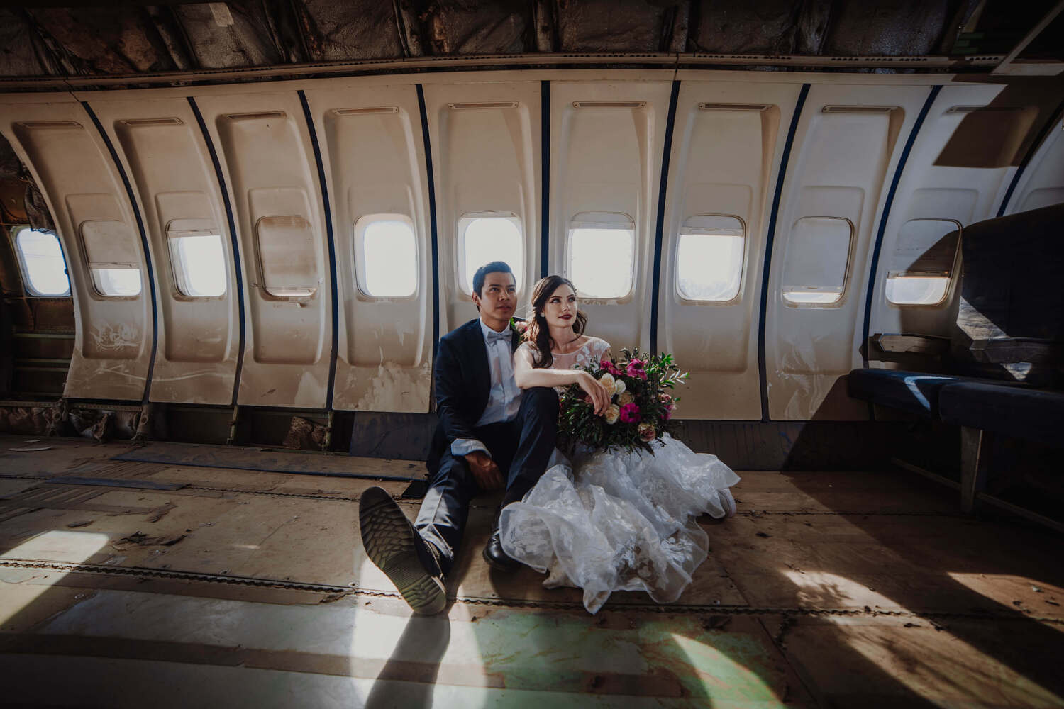 A couple hugging with love in a crashed airplane
